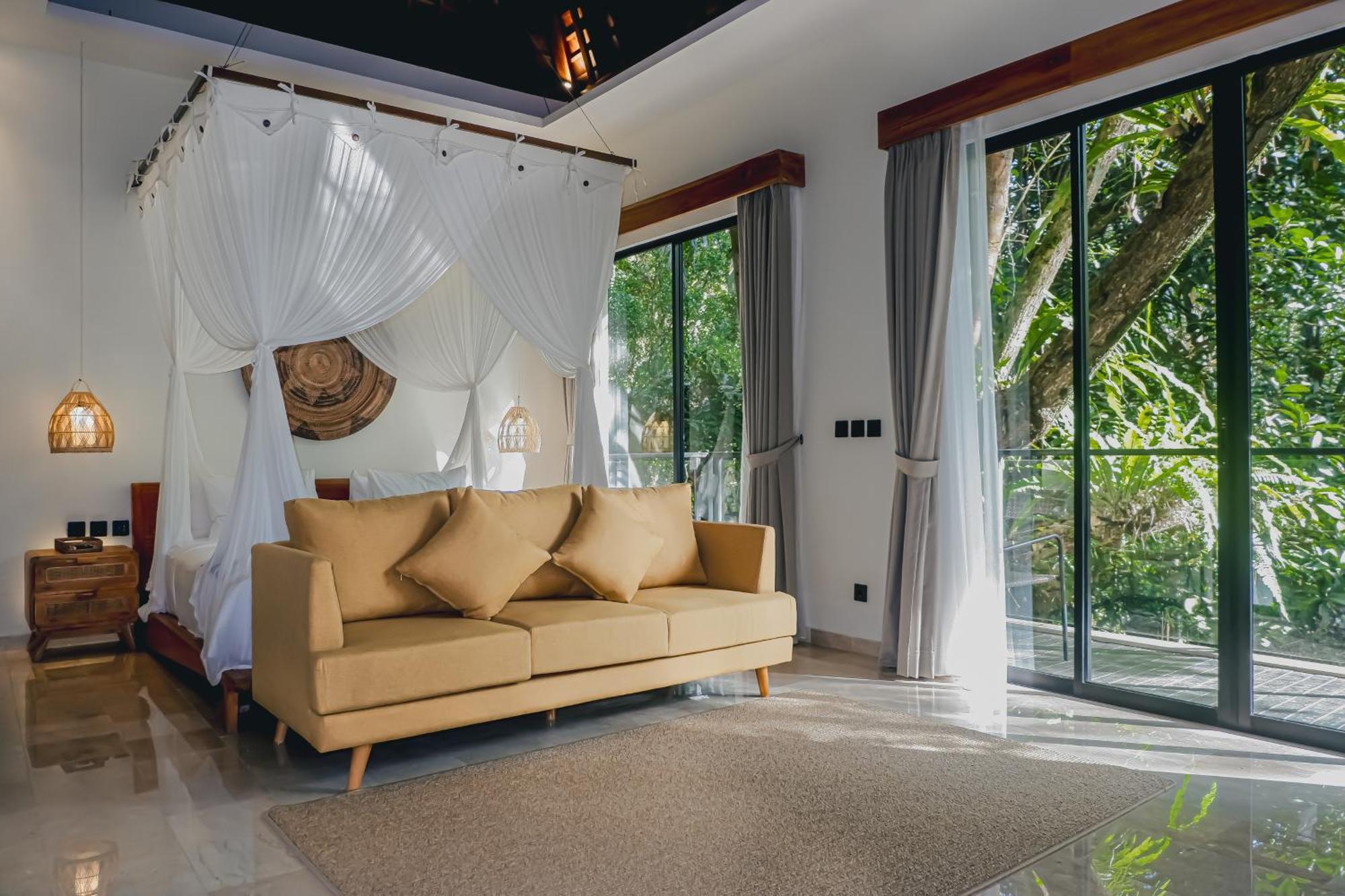 The Sebali Resort Ubud Exterior foto A bedroom at the resort