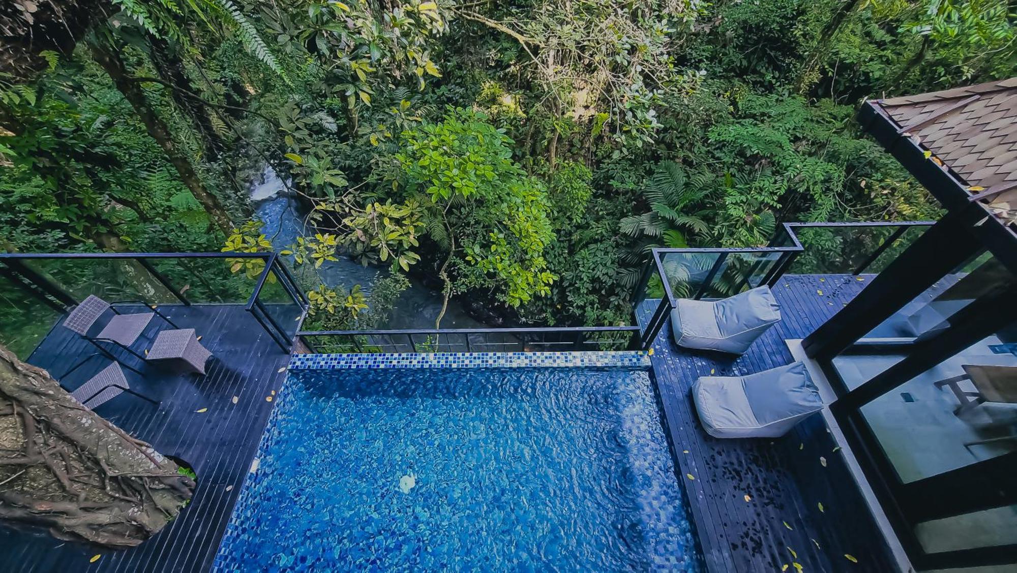 The Sebali Resort Ubud Exterior foto The swimming pool at the resort